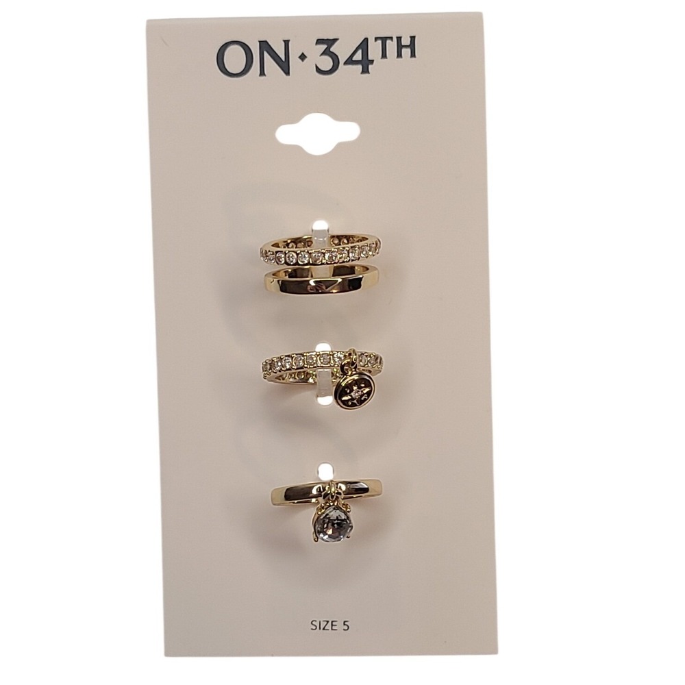 ON‎ 34TH Womens Gold Tone Set 3 Rings Size 5 Clear Stone Charm Compass